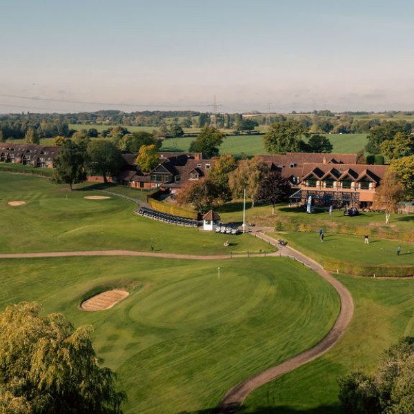 drone footage of golf course on charity day